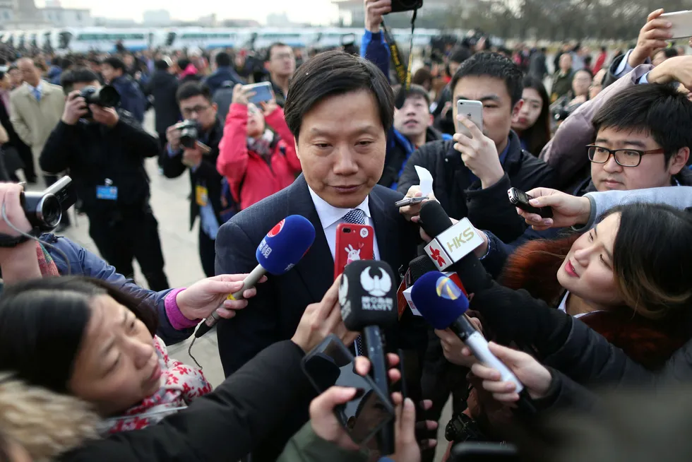 Grunnlegger Lei Jun av det kinesiske teknologiselskapet Xiaomi er medlem av Folkekongressen og har deltatt på møter de siste to ukene. Nå forbereder han en av verdens største børsnoteringer. Foto: China Stringer Network/Reuters/NTB Scanpix