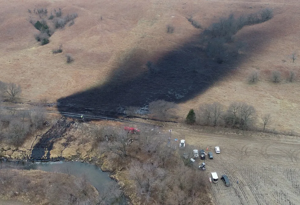 Remediation: Emergency crews work to clean up a large US crude oil spill, following a Keystone pipeline rupture in Washington County, Kansas.