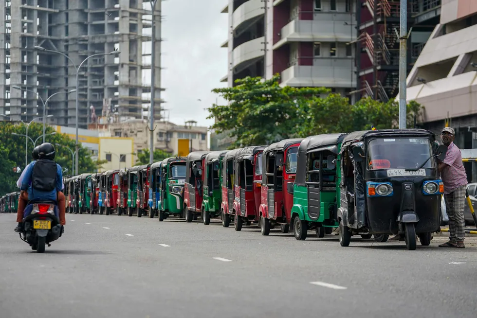 Fuel crisis: Tuk-tuks queue for petrol in Colombo.