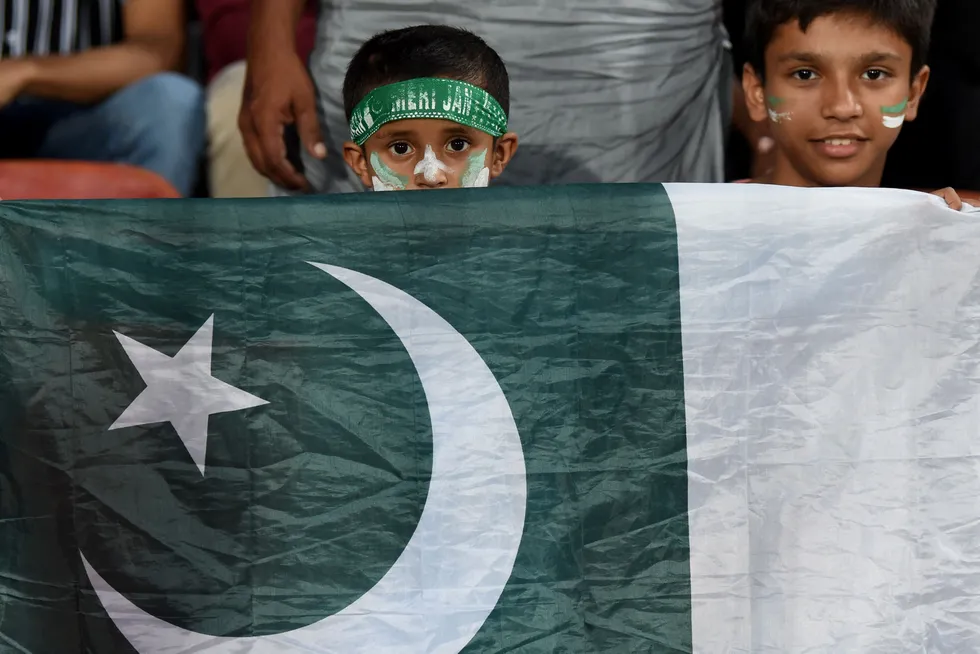 National pride: children hold Pakistan's flag during the Asia Cup 2023 one-day international cricket match between Pakistan and Bangladesh in September 2023.