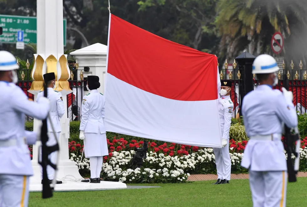 Host country: the Indonesian flag flies in a national day ceremony