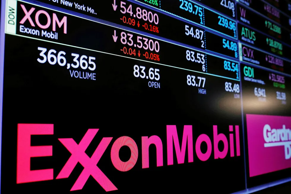 Supermajor: an ExxonMobil logo on a monitor above the floor of the New York Stock Exchange