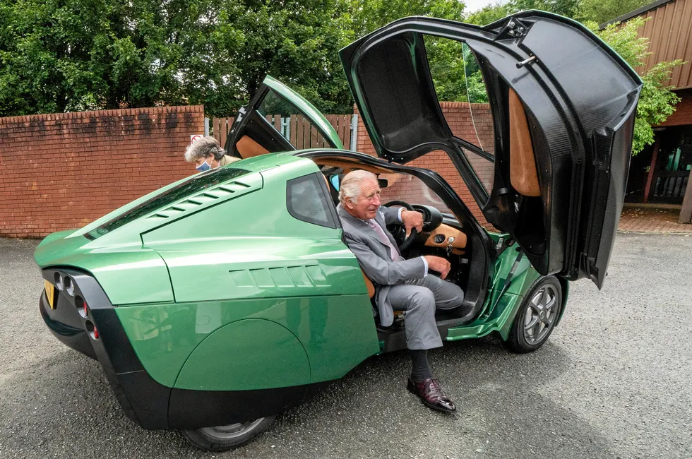 Britain's King Charles (then Prince of Wales) exits the Riversimple Rasa after taking it for a test drive in July 2021.