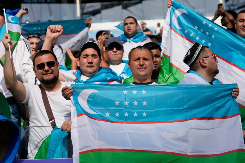 Operations: Uzbekistan supporters at the Asian Cup football tournament in Qatar's Al Janoub Stadium on Tuesday 30 January.