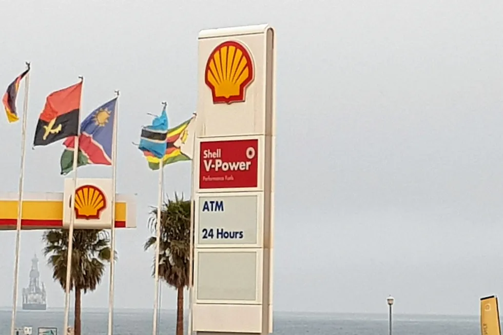 Drilling ahead: Shell's logo and national flags at a fuel station outside Walvis Bay, Namibia