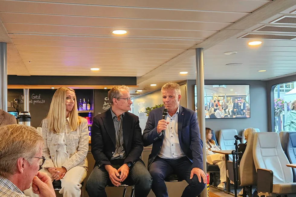 "We will clarify the tax in connection with the 2024 budget," Norway's Fisheries Minister Bjornar Skjaeran (right) told industry representatives at a conference in Arendal.
