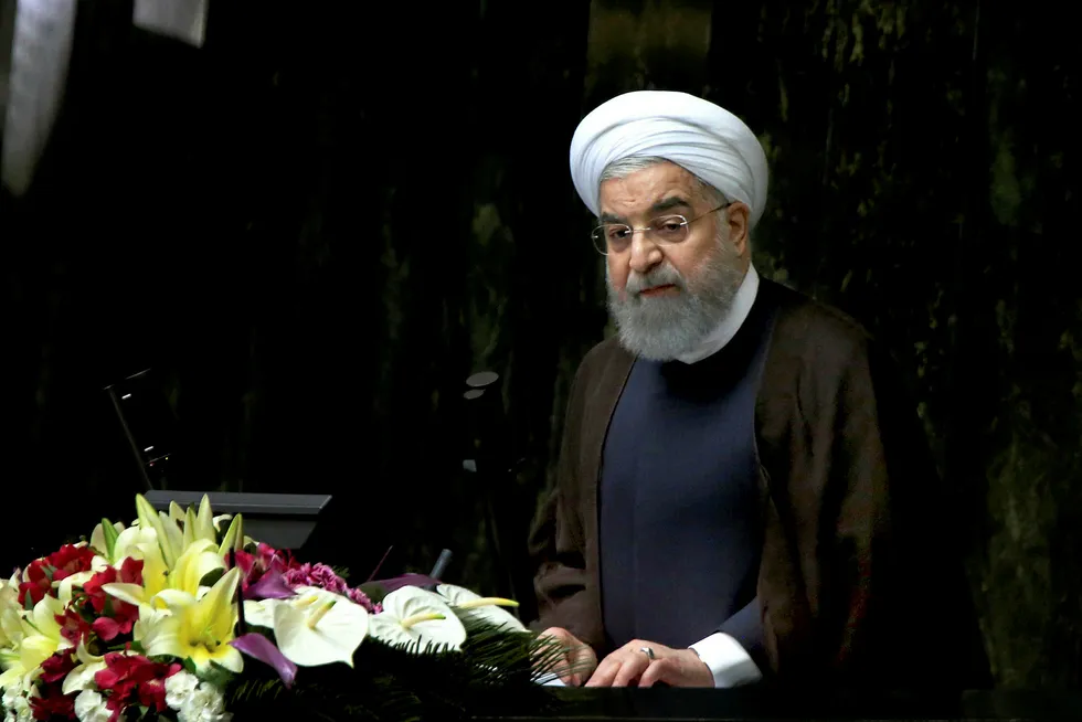 Centre stage: Iranian President Hassan Rouhani speaks during a parliament debate in Tehran this week