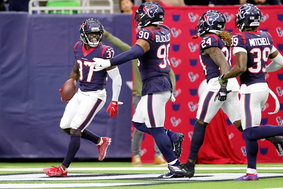 On the ball: Houston Texans players celebrate an interception in a recent game at the NRG Stadium