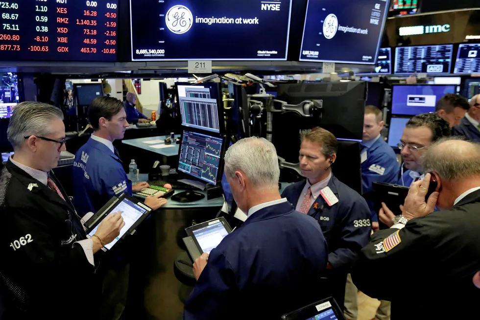 On the floor: traders at the New York Stock Exchange this week