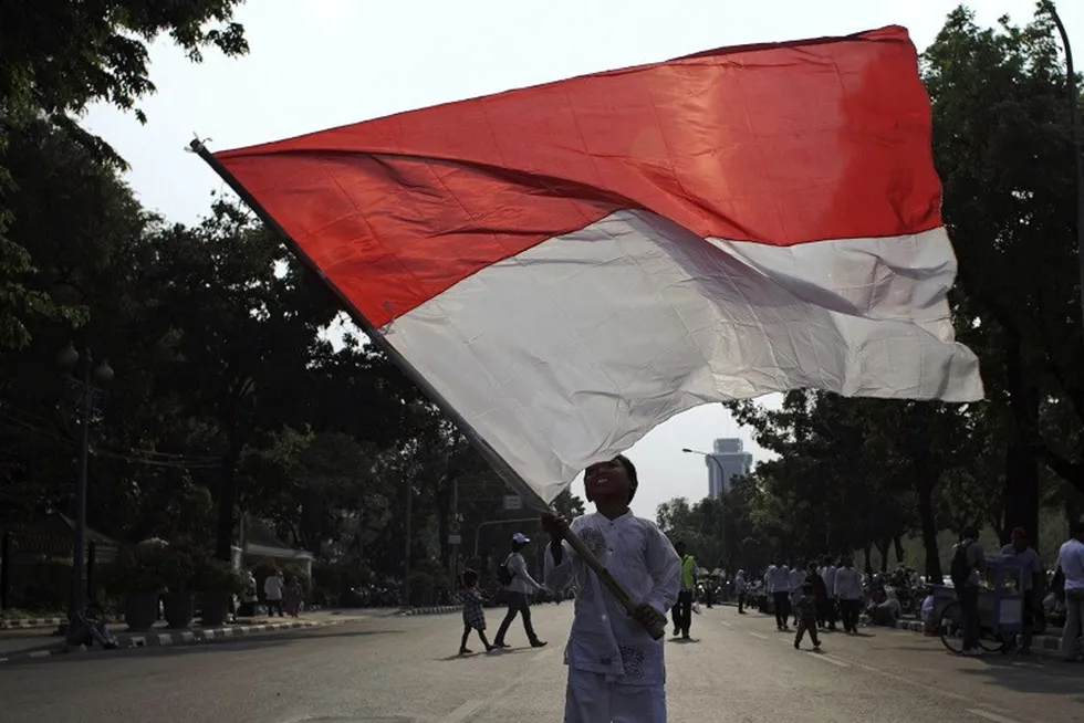Patriotic: the Indonesian flag being waved in the capital Jakarta