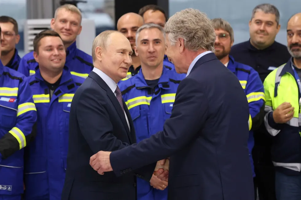 Assurances: Russian President Vladimir Putin (left) greats Novatek executive chairman Leonid Mikhelson at a Novatek-run LNG construction yard in Belokamenka in Russia’s Murmansk region.