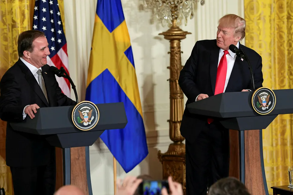 Podium clash: US President Donald Trump, right, and Swedish Prime Minister Stefan Lofven