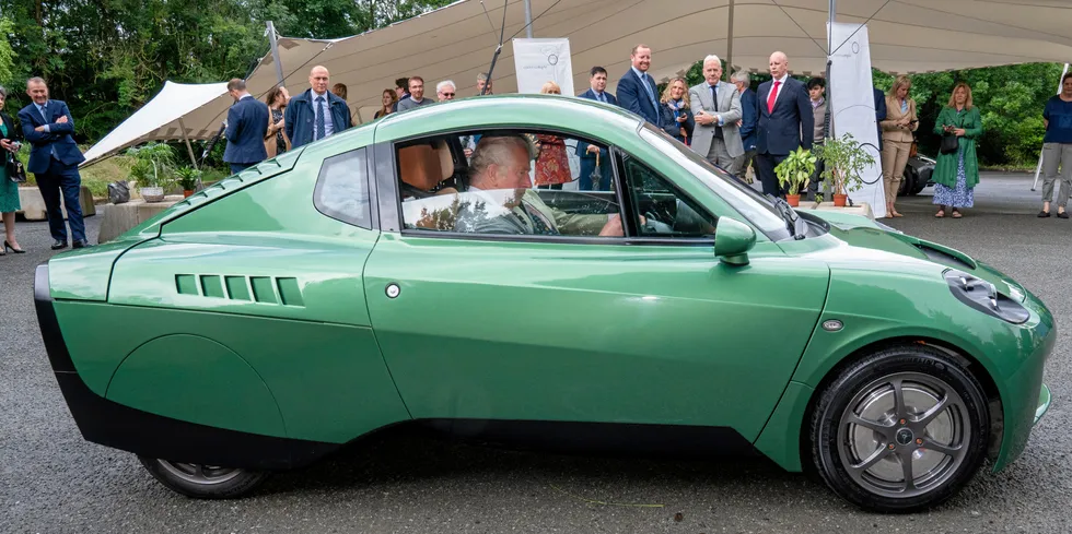 The UK's Prince Charles taking the prototype hydrogen-powered Riversimple Rasa for a test drive in Wales in July.