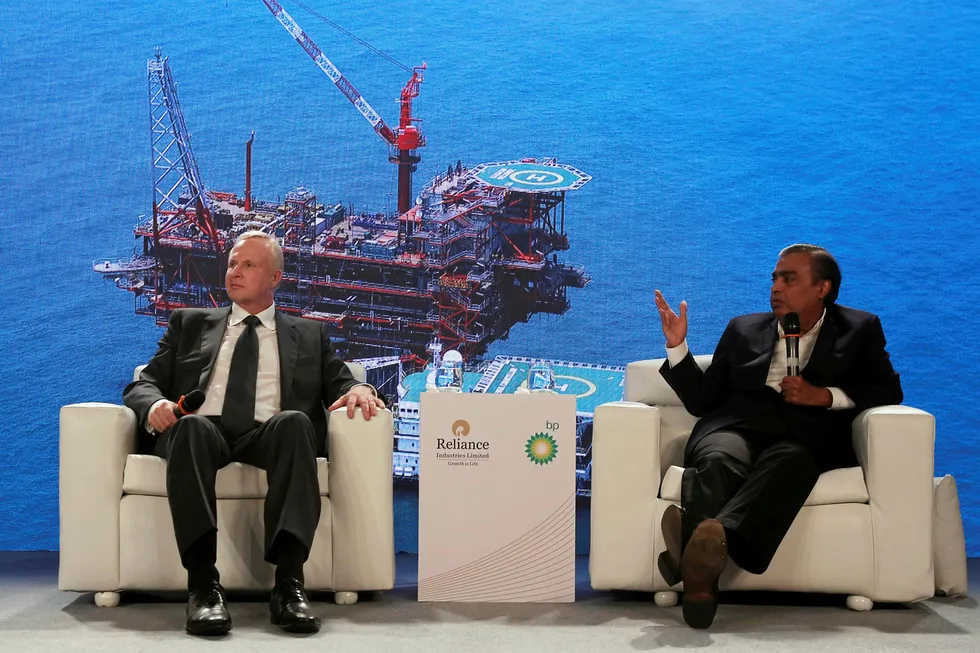 Team players: Reliance Industries managing director Mukesh Ambani (right) gestures as he answers a question while BP chief executive Bob Dudley listens