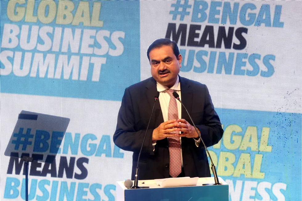 Ambitious: Indian billionaire Gautam Adani addresses delegates during the Bengal Global Business Summit in Kolkata, in April