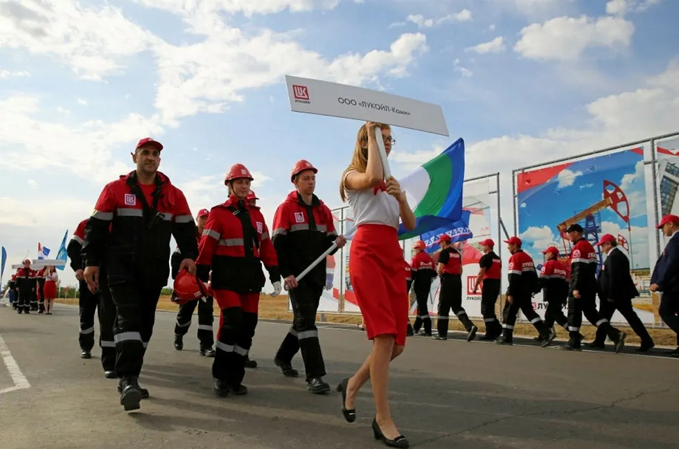 Moving forward: delegation of workers from Lukoil subsidiary Lukoil-Komi march at opening of a technical competence competition