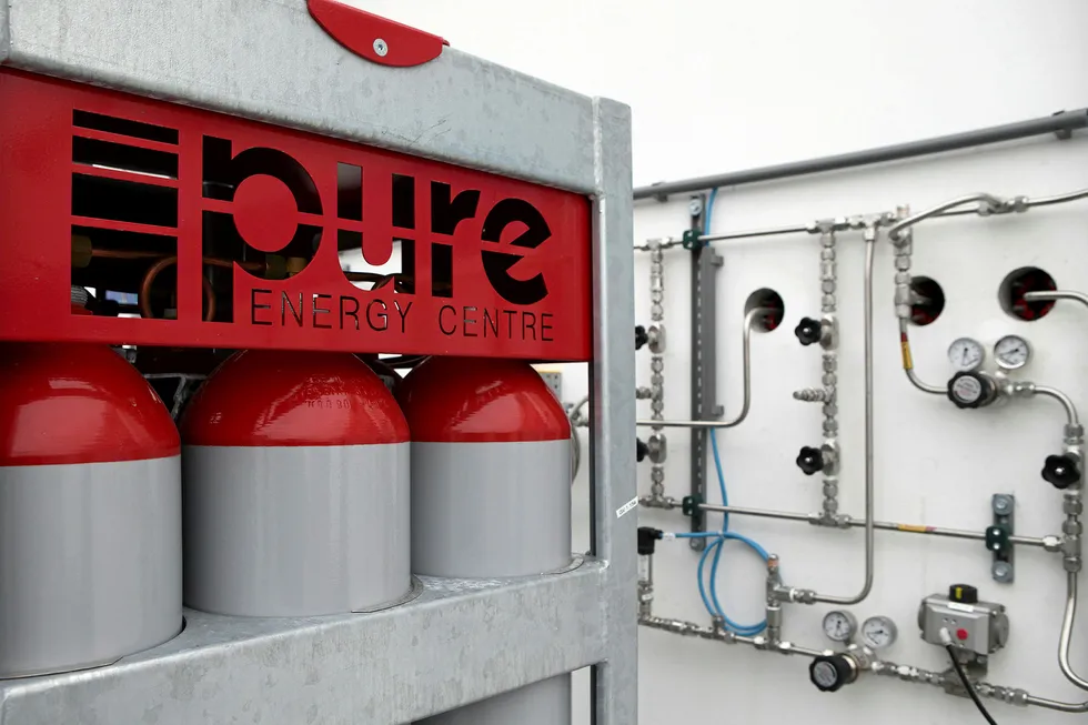 Impact: hydrogen cylinders at a wind-to-hydrogen pilot plant in Auersthal, Austria