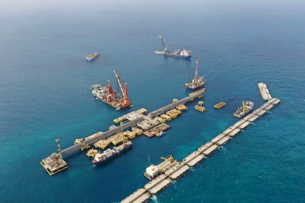 Progress: the hub terminal at BP's Greater Tortue Ahmeyim LNG project offshore Senegal and Mauritania, showing the breakwater in the foreground and jetty in the background