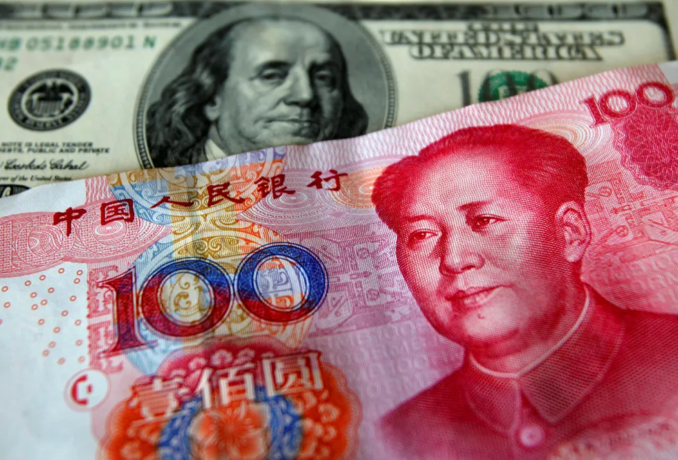 Kinas valuta yuan har svekket seg mot dollar med myndighetenes velsignelse. Foto: Nicky Loh/Reuters/NTB Scanpix