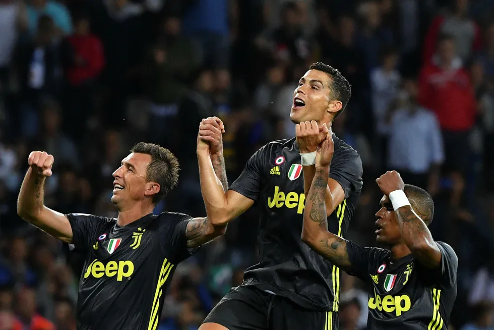 Juventus-spiller Cristiano Ronaldo (i midten) er en av de største trekkplastrene i årets Champions League, som TV 2 deler rettighetene til sammen med NENT.
