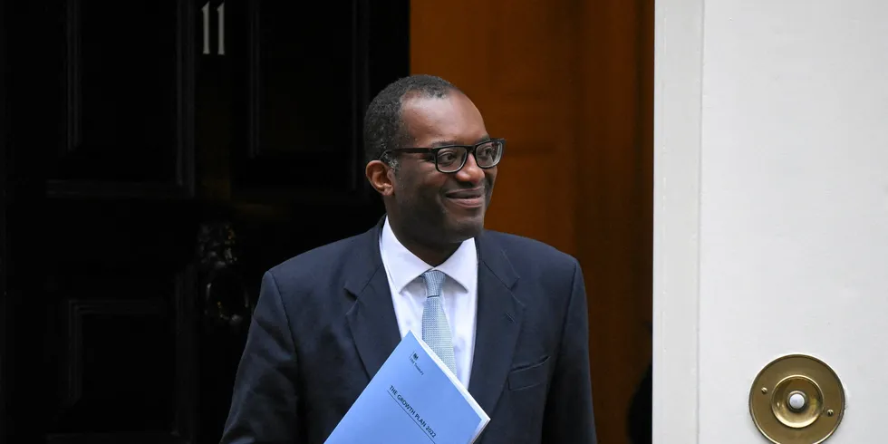 Britain's Chancellor of the Exchequer Kwasi Kwarteng walks out of Number 11 Downing Street on his way to unveil an anti-inflation budget plan in London on September 23, 2022.