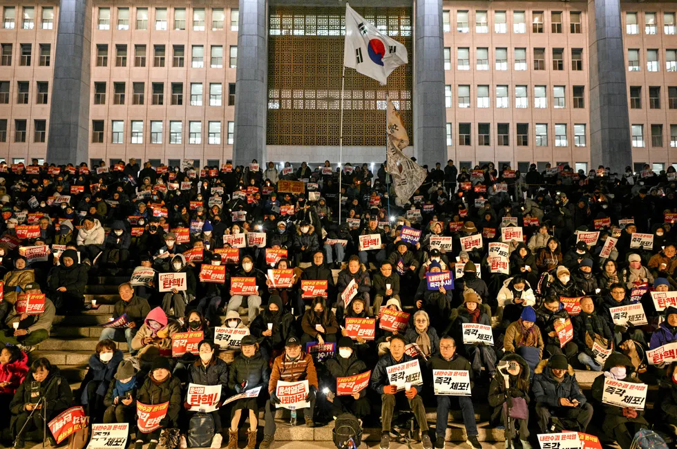 Citizens gather outside the National Assembly in Seoul to protest against the attempted imposition of martial law by the now-deposed president Yoon Suk Yeol earlier this month.