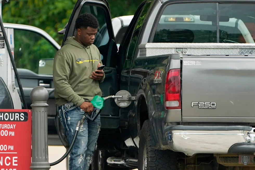 Pump pain: A customer buying diesel at a service station in Mississippi, US, last year.