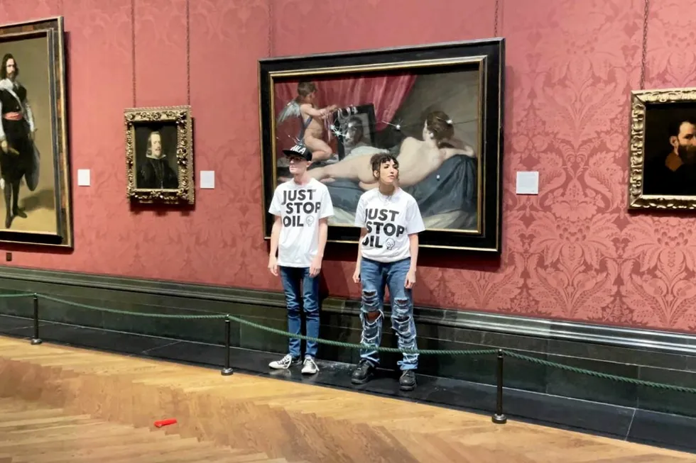 Smashed: Two Just Stop Oil protesters address visitors at the National Gallery in London after damaging glass that protects the famous Rokeby Venus painting by Diego Velazquez.