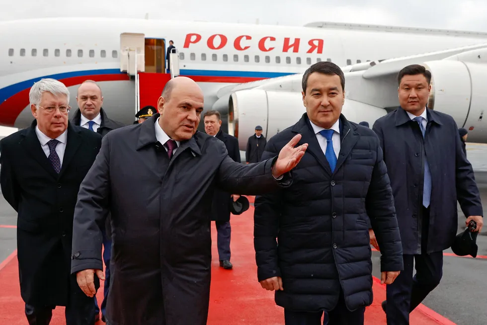 Dangerous neighbourhood: Russian Prime Minister Mikhail Mishustin (centre left) and Kazakhstan Prime Minister Alikhan Smailov (centre right).