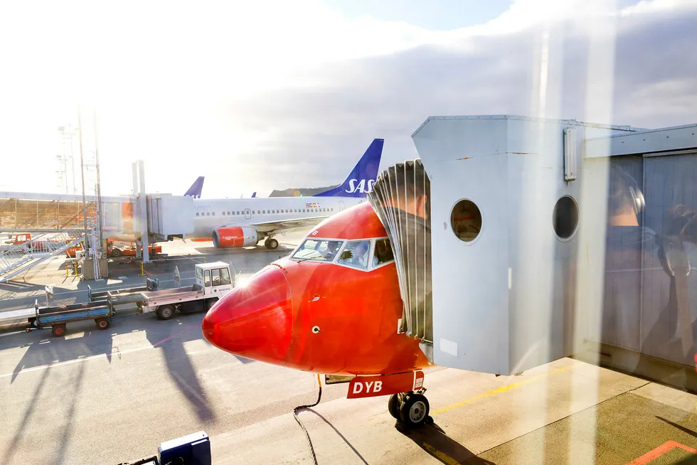Norwegian har hatt problemer med å få passasjerene av gårde grunnet pilotmangel den siste uken. Her fra Gardermoen. Foto: Gorm Kallestad/NTB Scanpix