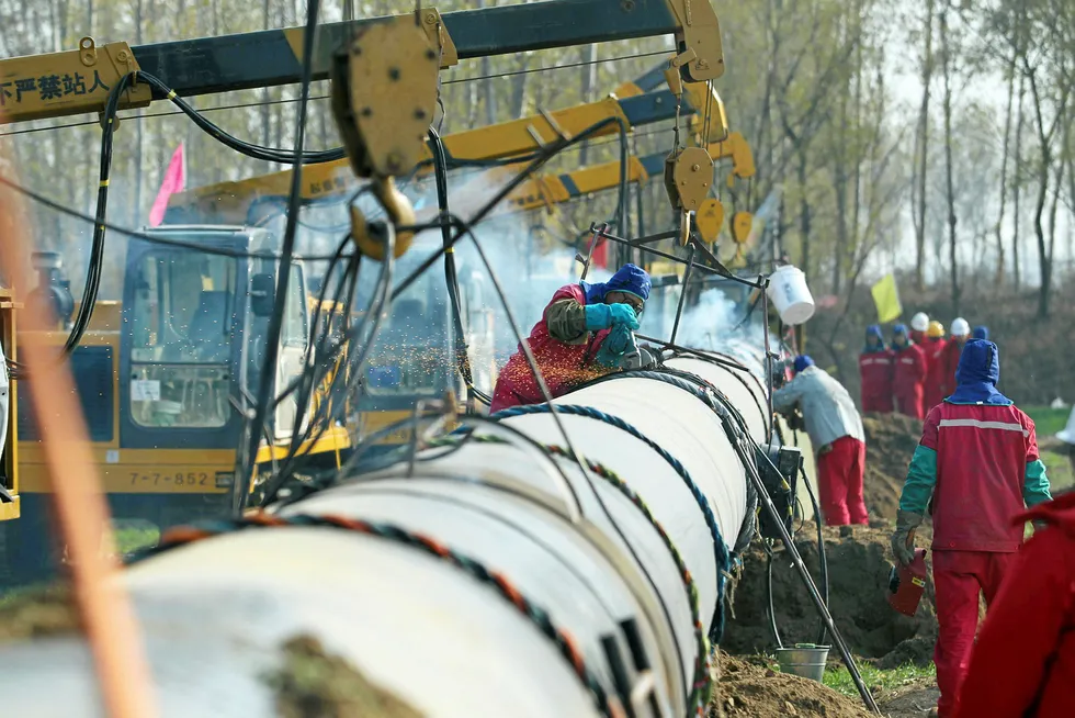 At work: laying a section of a CNPC gas pipeline network