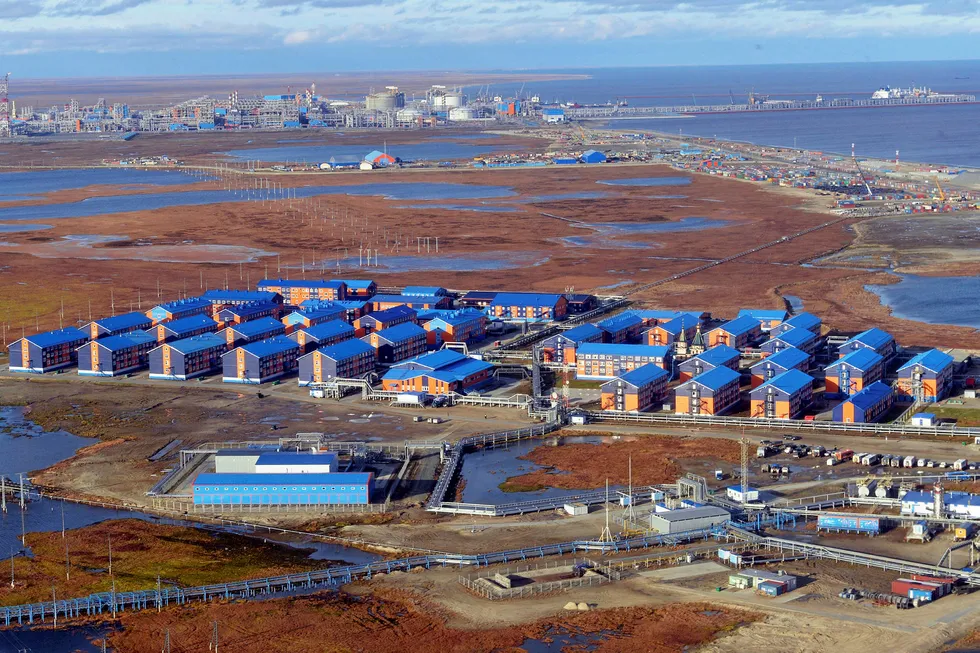 Isolation: dormitories in the town of Sabetta in Russia that host workers of Yamal LNG plant seen in the background