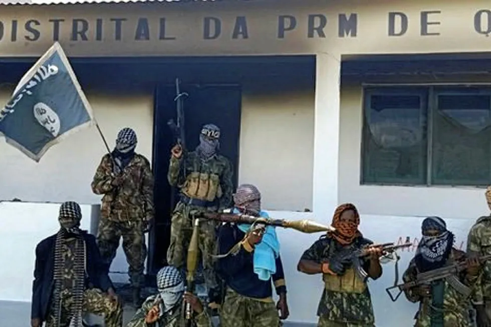 Attack: A photo claiming to show Islamic militants outside a district office in Quissanga, Mozambique