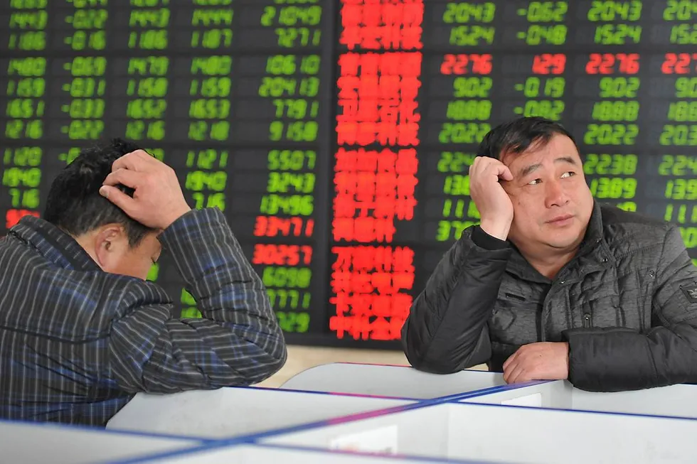 Investorer på en av de kinesiske børsene. Illustrasjonsfoto: China Daily.