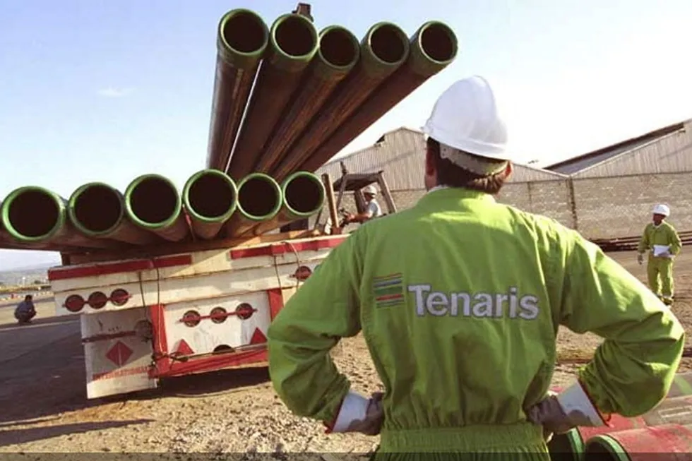Alone: a Tenaris worker performing technical assistance during pipe-handling. The Argentine steel pipe manufacturer was the only bidder in a government tender