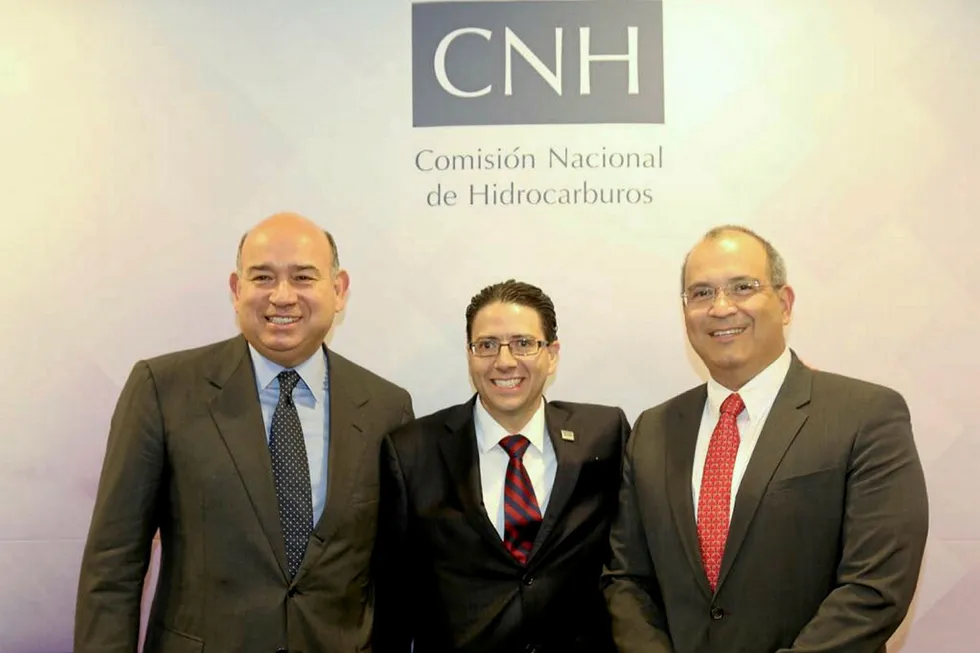 Service migration: Pemex chief executive Carlos Trevino, right, celebrates new contract with CNH president commissioner Juan Carlos Zepeda and