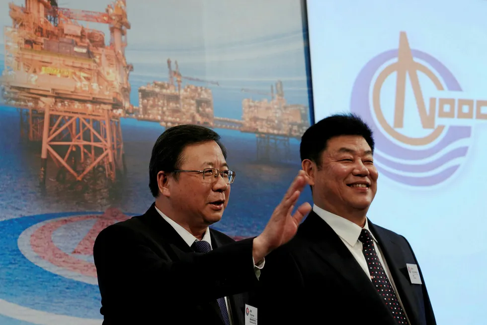 CNOOC Ltd chief executive Yuan Guangyu (right)