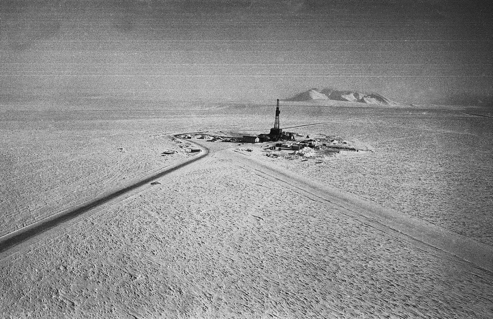 Out of favour: an oil rig stands on the shore of the Arctic Ocean