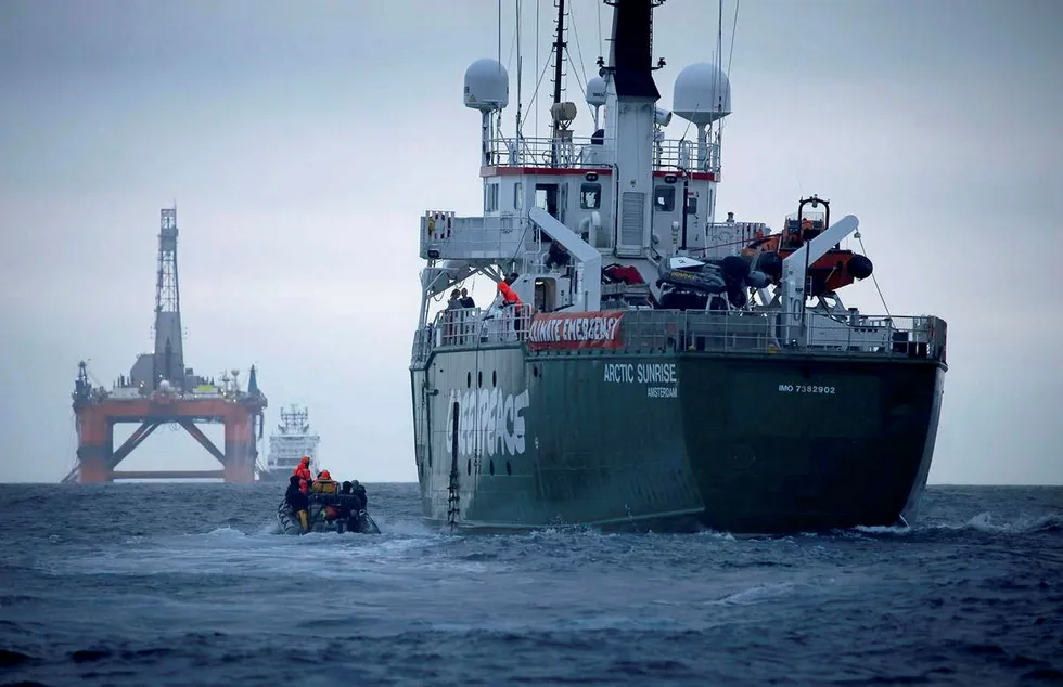 Protesting: Greenpeace ship Arctic Sunrise follows the BP chartered Transocean 'The Paul B Loyd Jr' rig en route to the Vorlich field in the North Sea