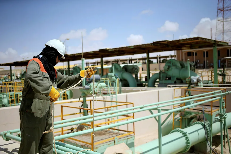 Force majeure: a worker maintains oil pipelines at the Zueitina oil terminal