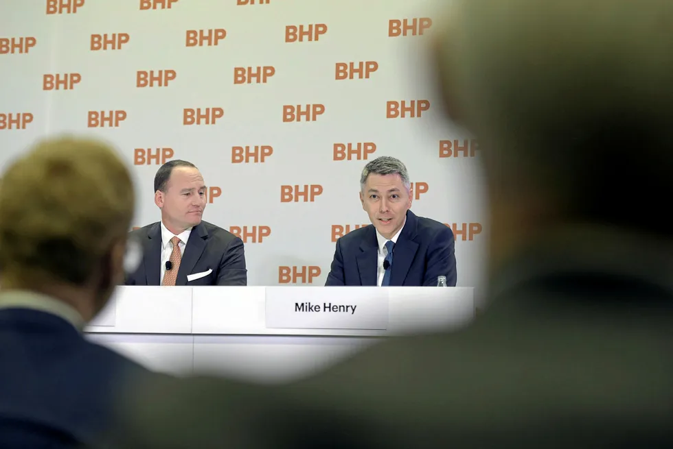 Decisions: BHP chairman Ken MacKenzie (left) and new chief executive Mike Henry (right)