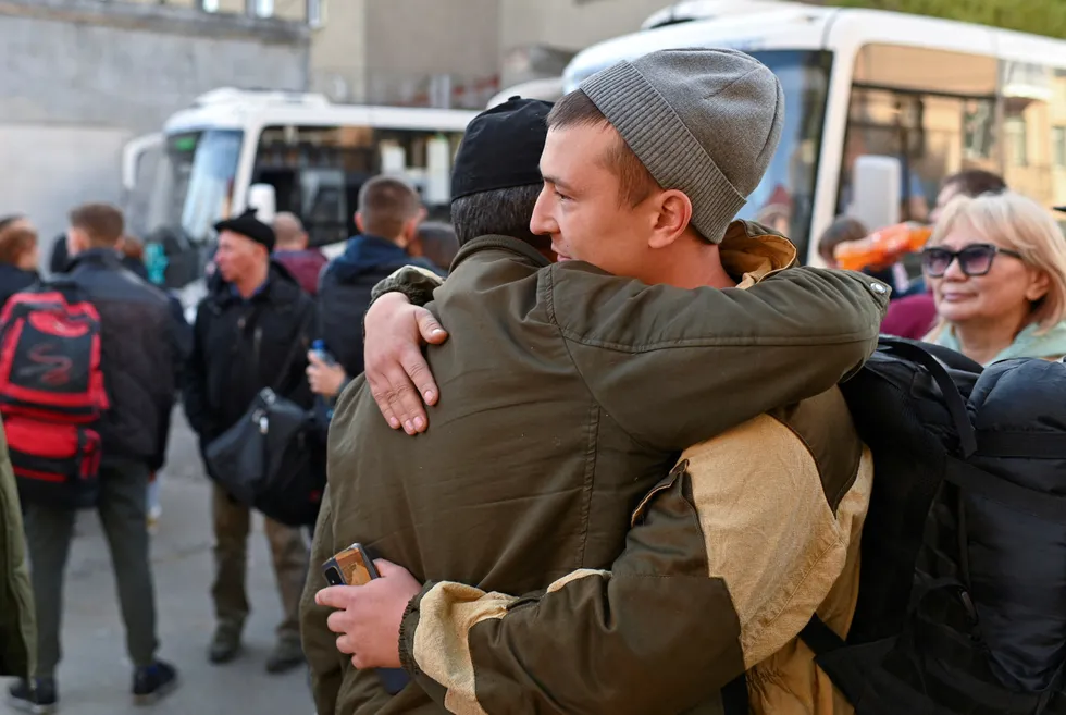 Compensation: Russian reservists in the city of Omsk bid farewell to relatives and acquaintances before their departure under the partial mobilisation of troops in October 2022.