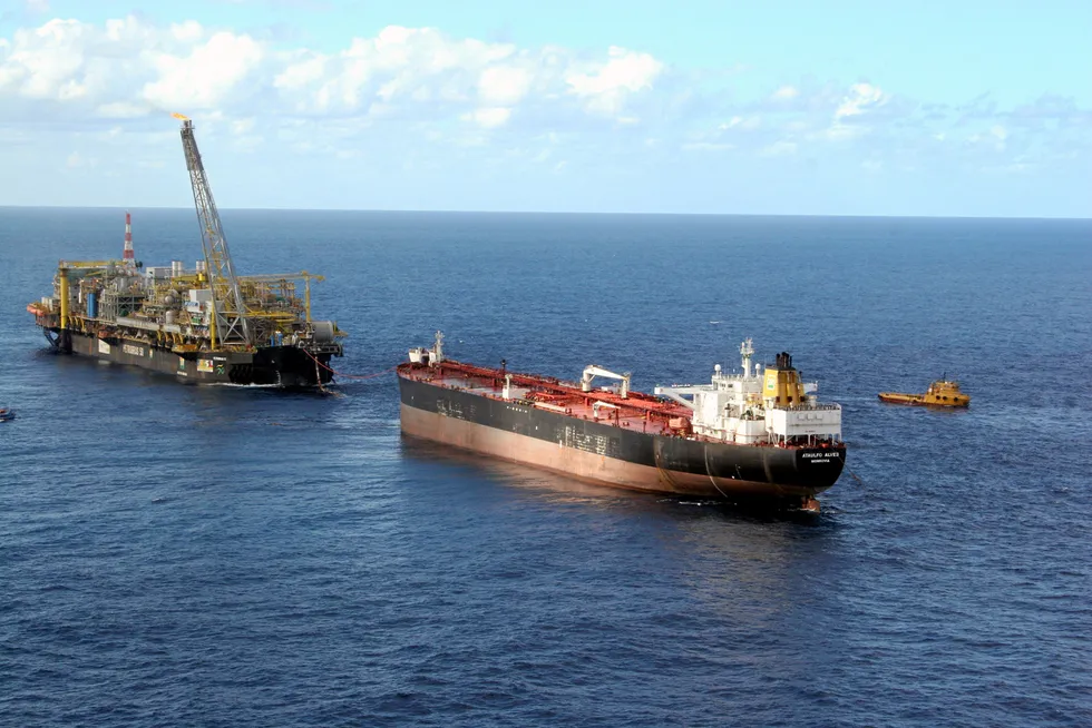 On the block: the Petrobras-owned P-50 FPSO offloading to a shuttle tanker on the Albacora Leste field offshore Brazil