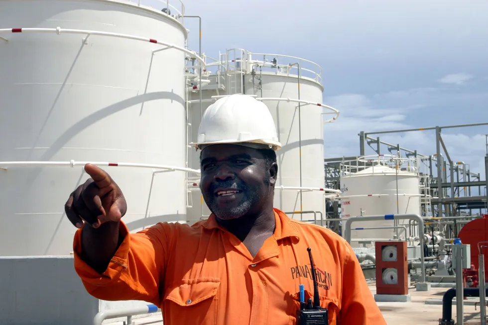 Pointing the way: an engineer gestures at the Songas gas processing plant on Songo Songo Island in Tanzania, one of the first domestic gas projects in Sub-Saharan Africa.