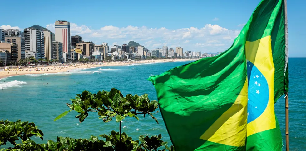 The Brazilian flag flutters in the wind at the end of Leblon and Ipanema beaches in Rio de Janeiro. (Photo by Christopher Pillitz/Getty Images) . Brazil wind.