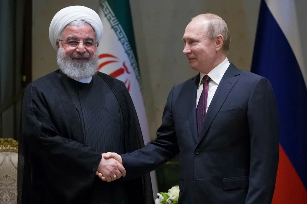 Irans president Hassan Rouhani og Russlands president Vladimir Putin møttes sist uke i Ankara. Nå går de sammen om en frihandelsavtale. Foto: Tolga Bozoglu/AP/NTB Scanpix