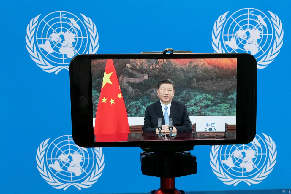 Chinese President Xi Jinping is seen on a video screen remotely addressing the 75th session of the United Nations General Assembly, 22 September, 2020