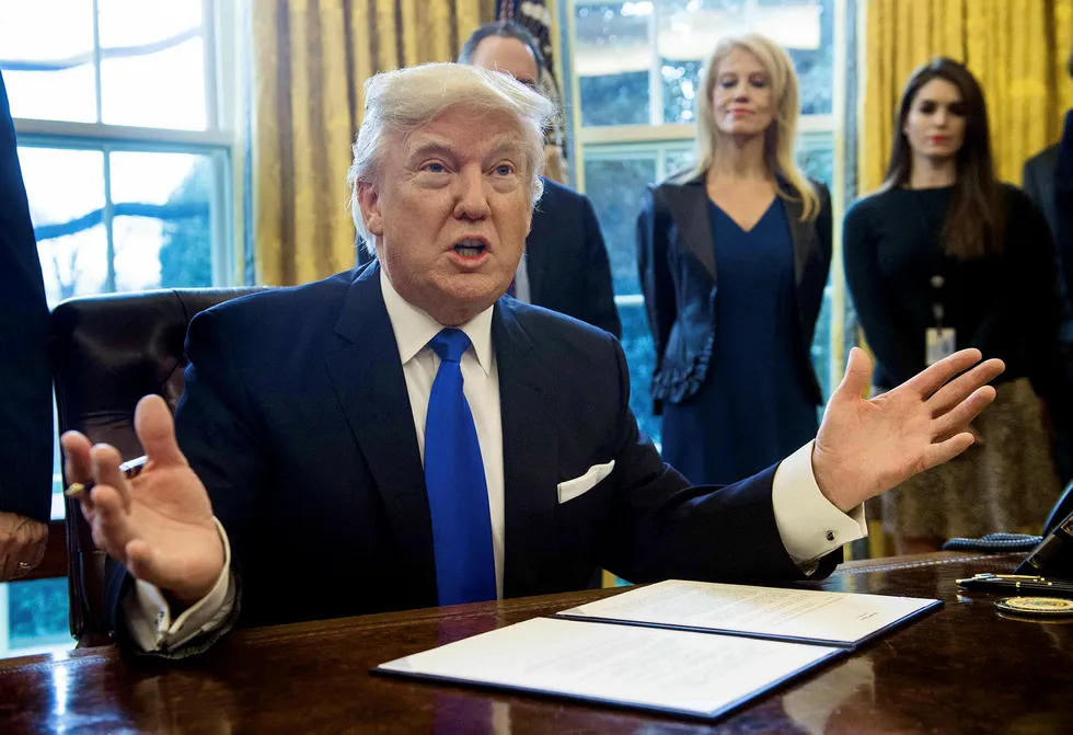 President Donald Trump mener frihandel har mye av skylden for tapte amerikanske arbeidsplasser, og han vil heller ha topartsavtaler med handelspartnere. Foto: NICHOLAS KAMM/AFP/NTB Scanpix