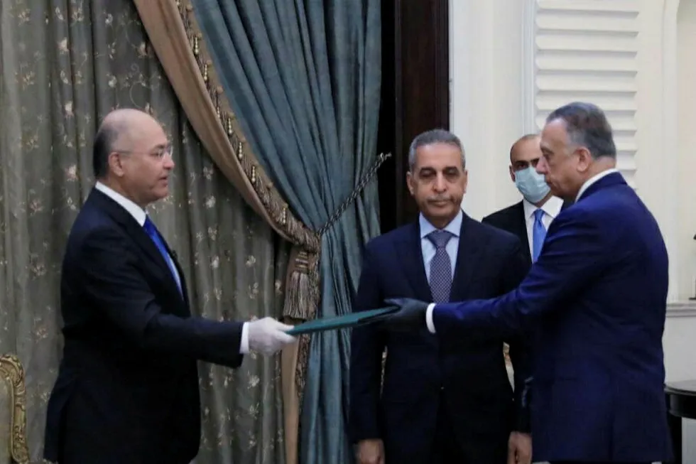 Change again: Iraq's President Barham Salih (left), with Prime Minister-designate Mustafa al Kadhimi in Baghdad