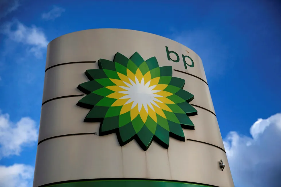 FILE - This Thursday, Jan. 15, 2015 file photo shows a BP logo outside a petrol station in the town of Bletchley in Buckinghamshire, England. The worlds biggest oil companies are slashing jobs and backing off major investments as the price of crude keeps falling - and it may be just the beginning. Oil company BP said on Tuesday, Jan. 12, 2016 it is cutting some 4,000 jobs in exploration and production over the next two years amid sharp declines in the price of crude as companies brace for a new normal of ever-falling prices. Other companies are also cutting back, such as Shell, which cut 6,500 staff and contractor positions last year. (AP Photo/Matt Dunham, File)
